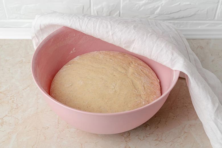 are any tricks to help my dough rise faster