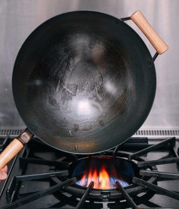 heating the wok for noodles