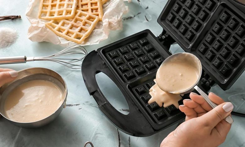 preparing the waffle machine