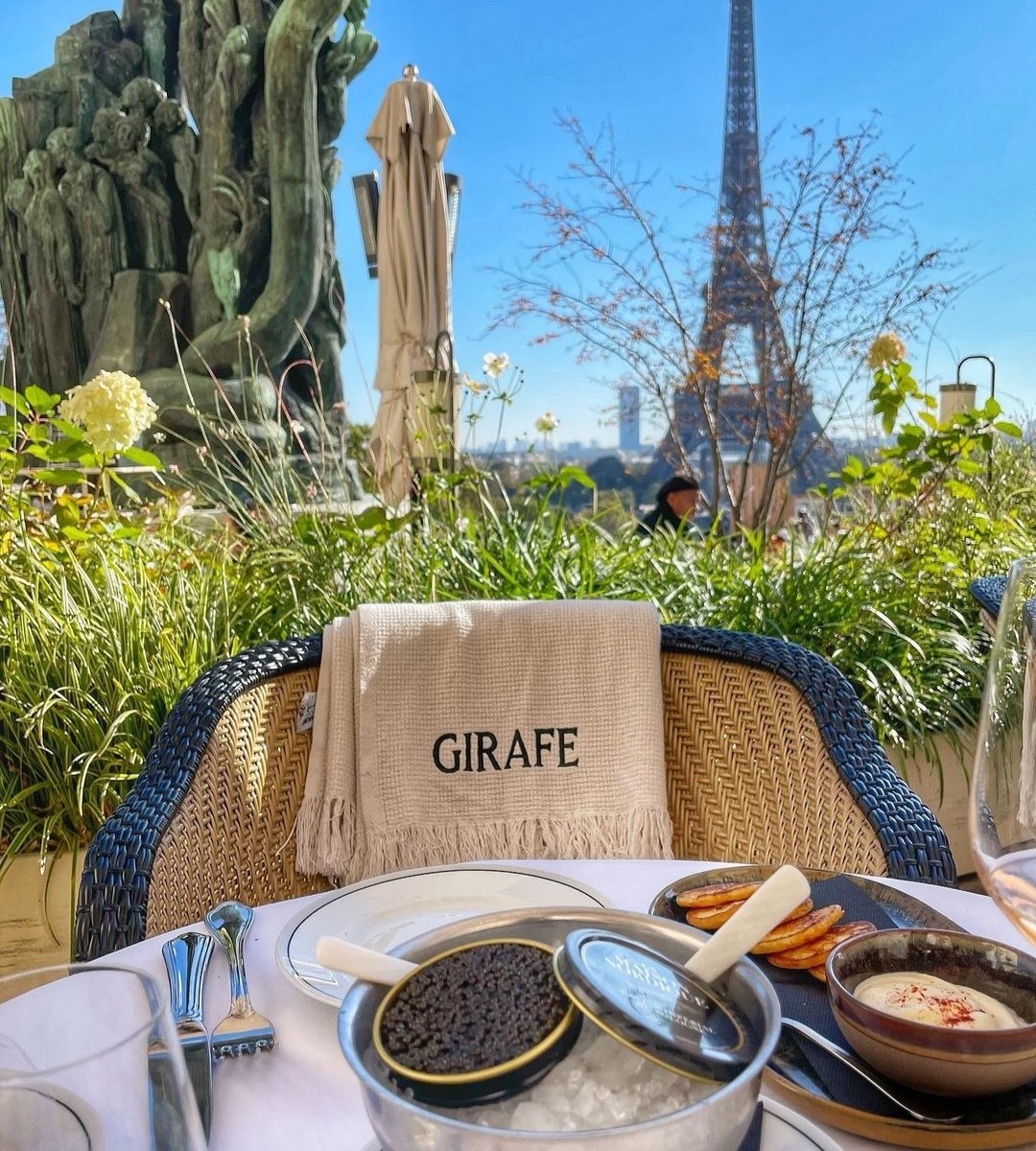 Girafe Paris Restaurant views with Eiffel Tower in the background