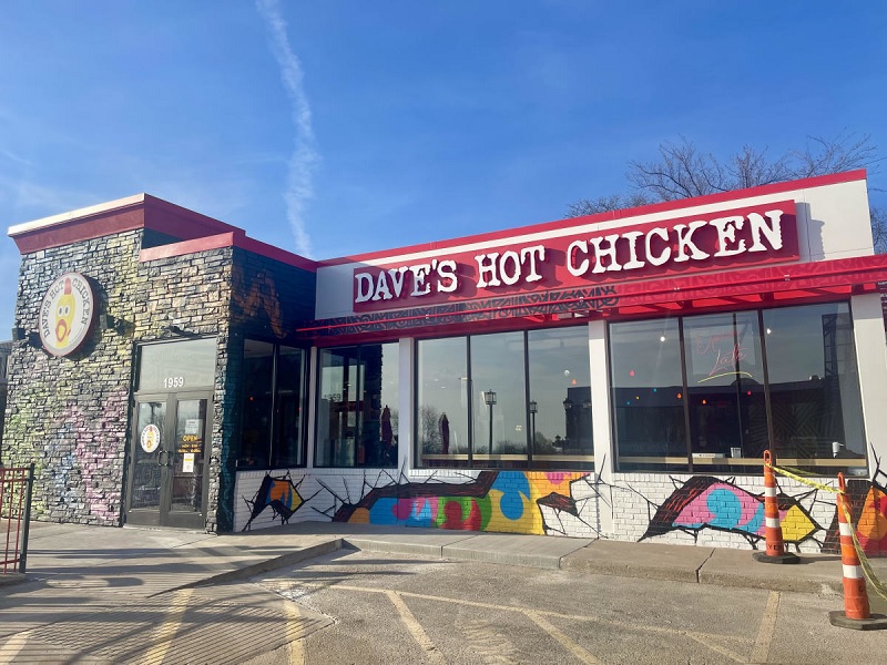 Exterior view of a Dave's Hot Chicken restaurant. Perfect for exploring the Dave's Hot Chicken menu.