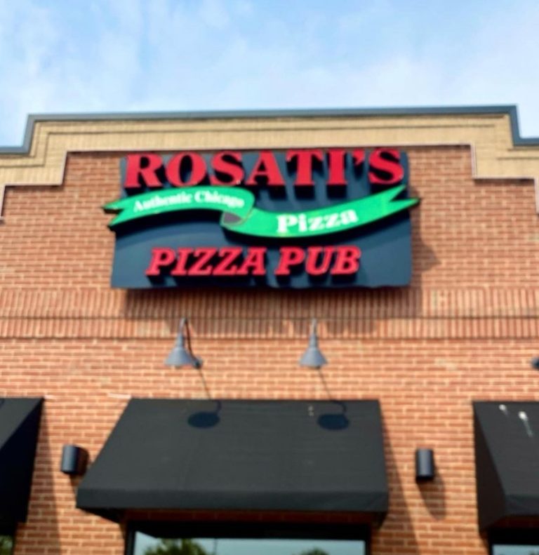 Exterior view of Rosati's Pizza restaurant with signage displaying 'Authentic Chicago Pizza,' inviting customers to explore the Rosati's Pizza menu.